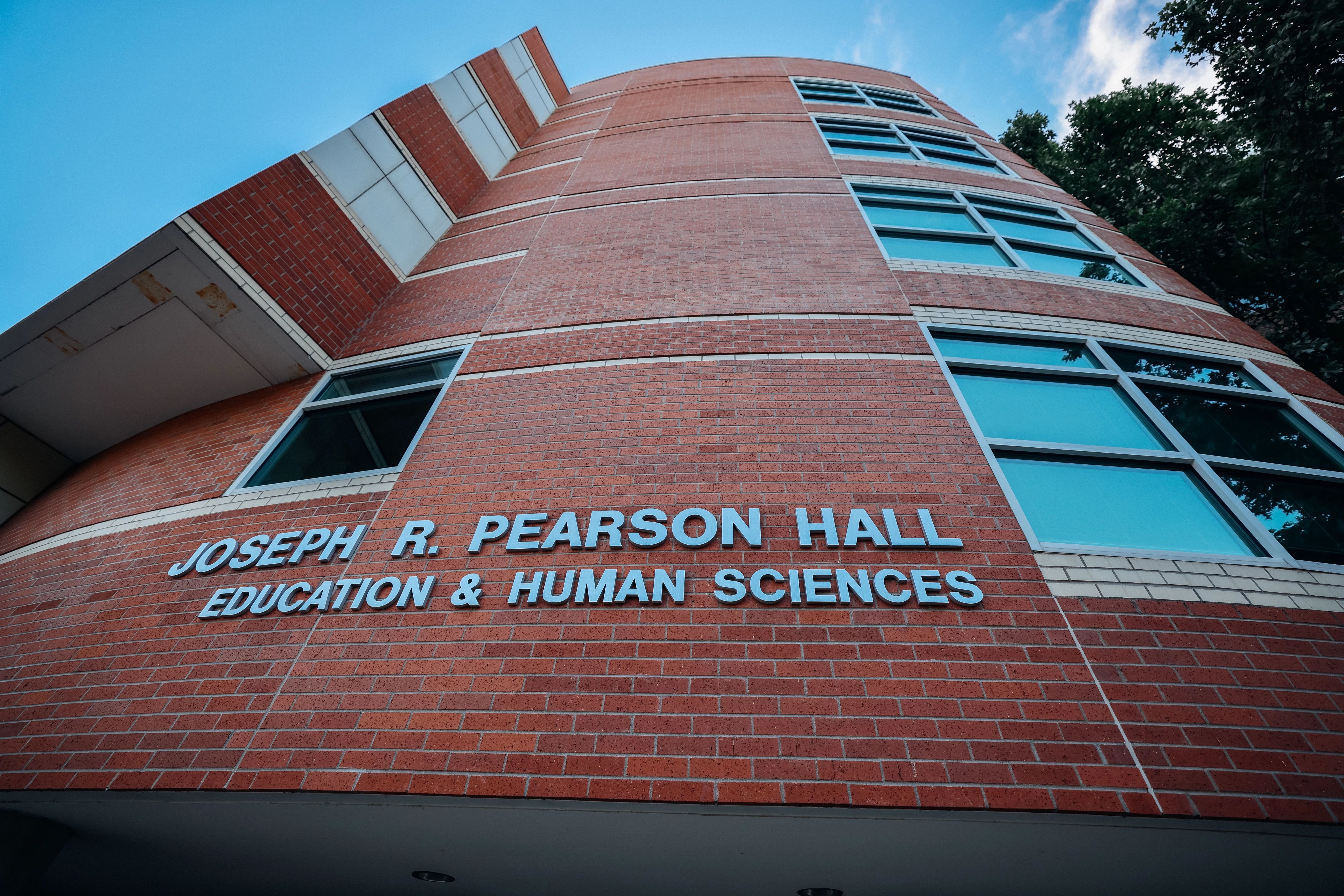 Picture of Joseph R Pearson Hall from base of the building looking straight to the roof